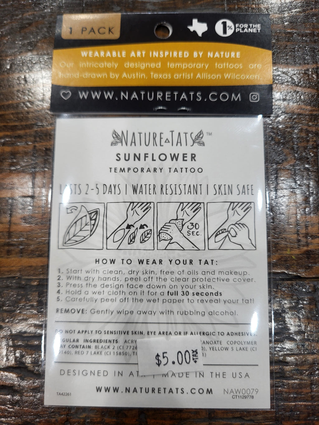 Sunflower temporary tattoo pack back with care instructions and sizing info.