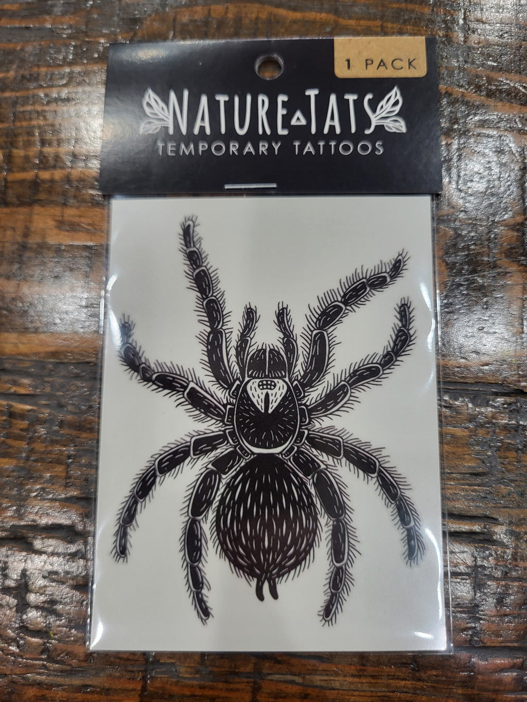 Tarantula temporary tattoo sheet in pack, black spider illustration