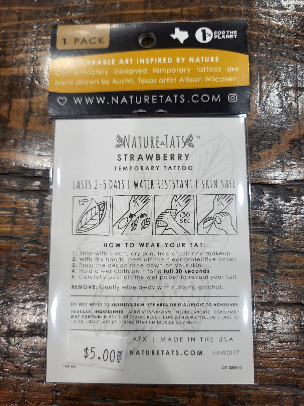 Temporary NatureTats tattoo back card with strawberry design and care instructions