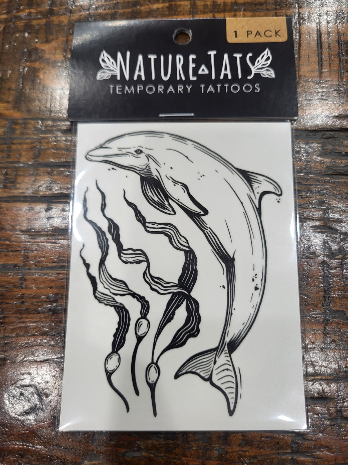 Dolphin temporary tattoo sheet in NatureTats pack with black dolphin outline