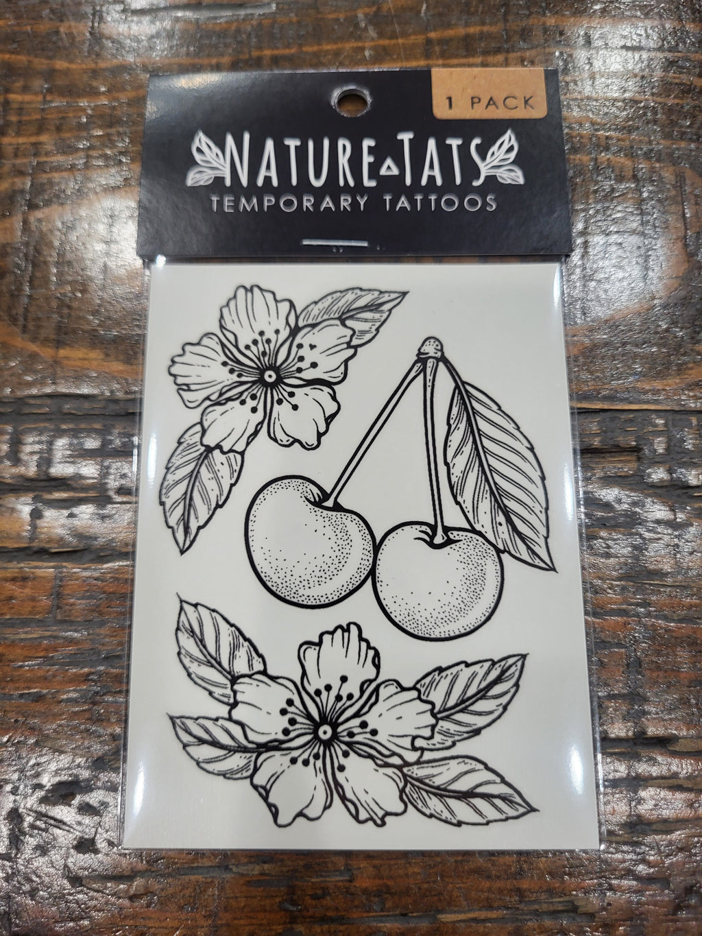 Cherries and flowers temporary tattoo sheet with outlined designs