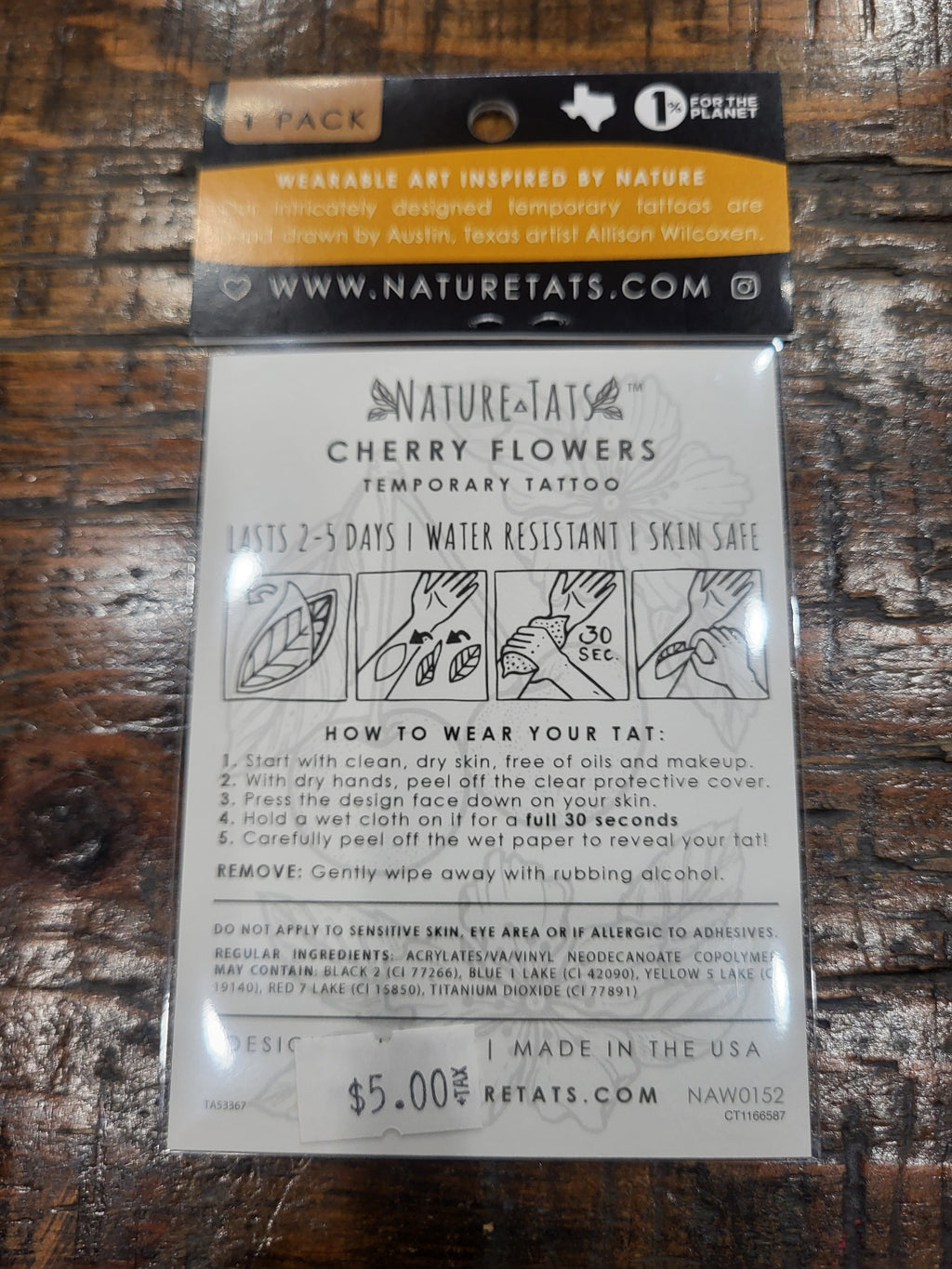 Temporary tattoo pack featuring nature-inspired cherries and flowers, on retail card