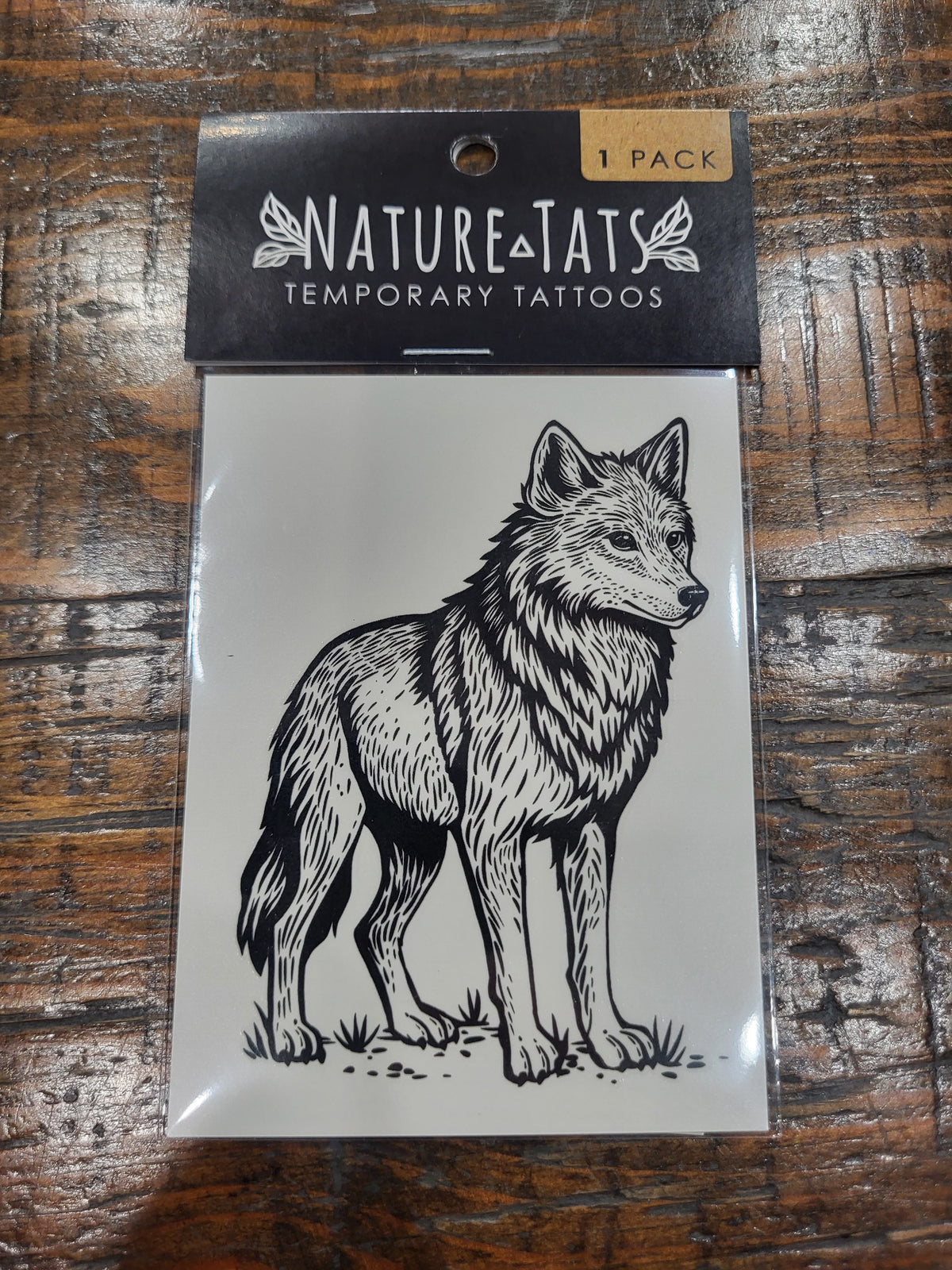 Wolf temporary tattoo pack with NatureTats branding and standing wolf illustration