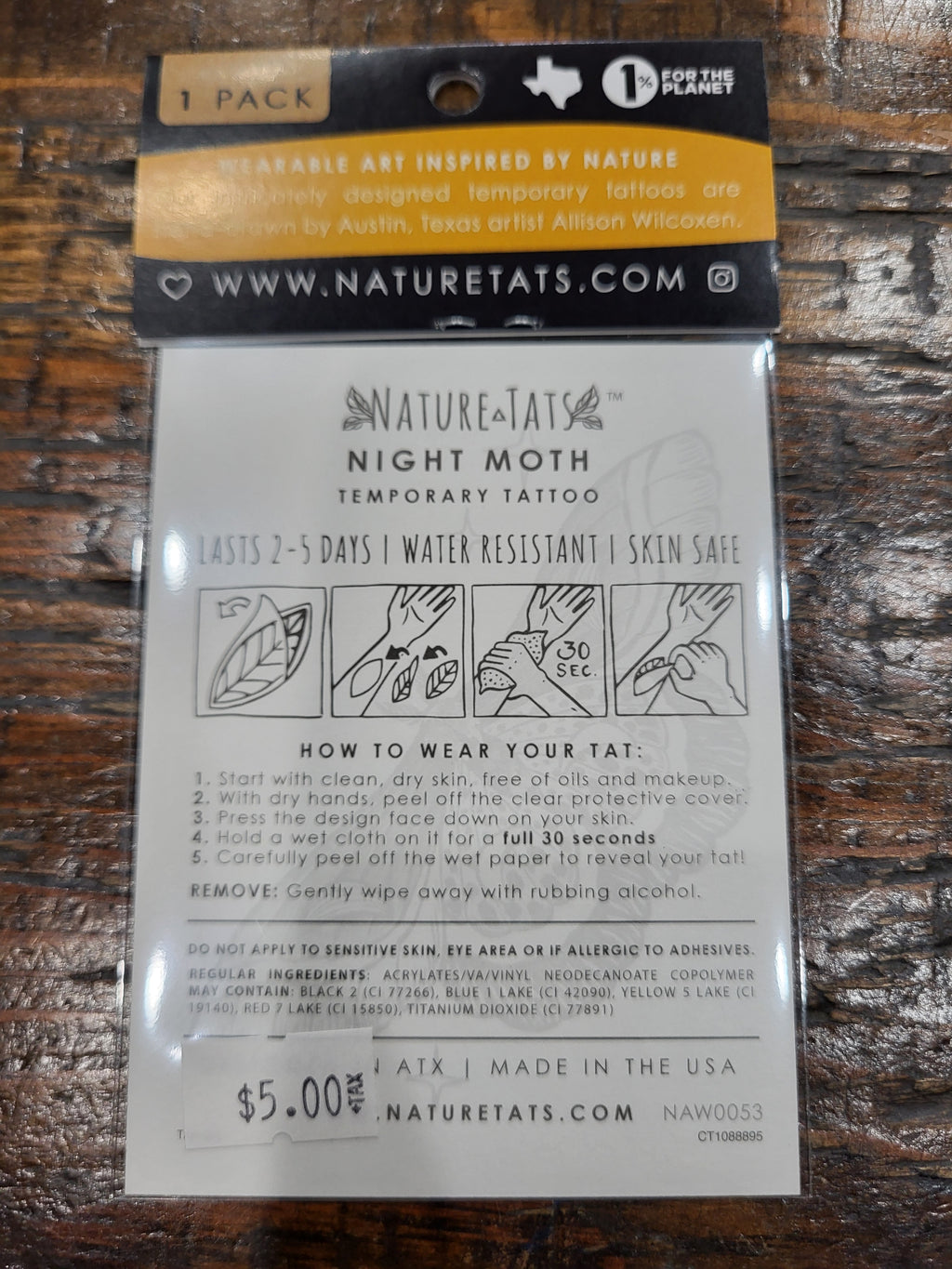 Night moth temporary tattoo pack insert with care instructions and website logo.