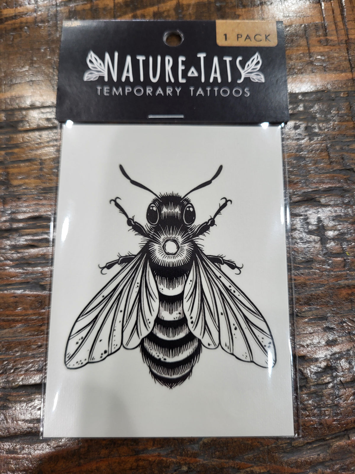 Bee temporary tattoo 1 pack box, black and white winged bee illustration.