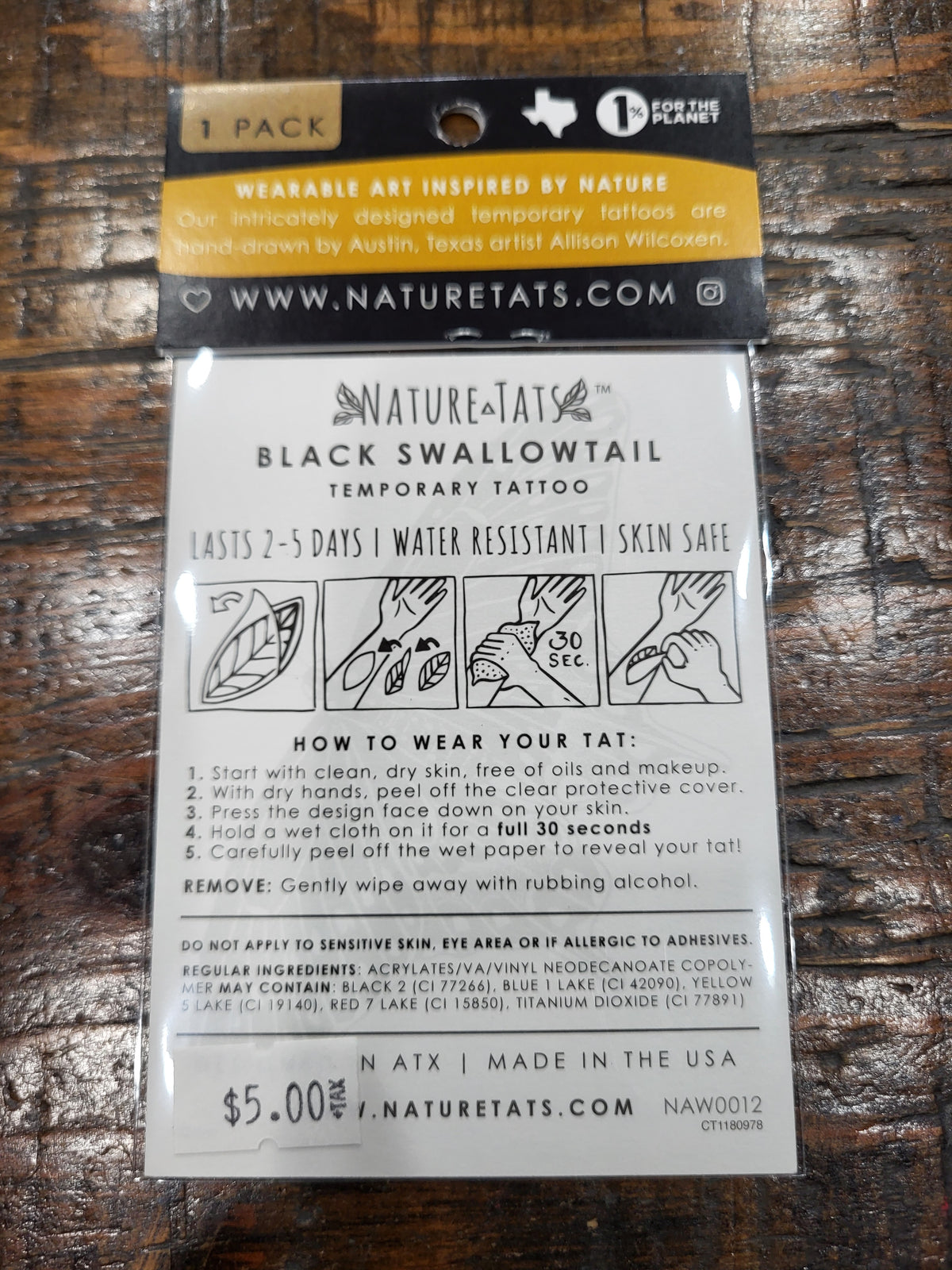 Temporary tattoo pack backing for black swallowtail butterfly, includes care instructions