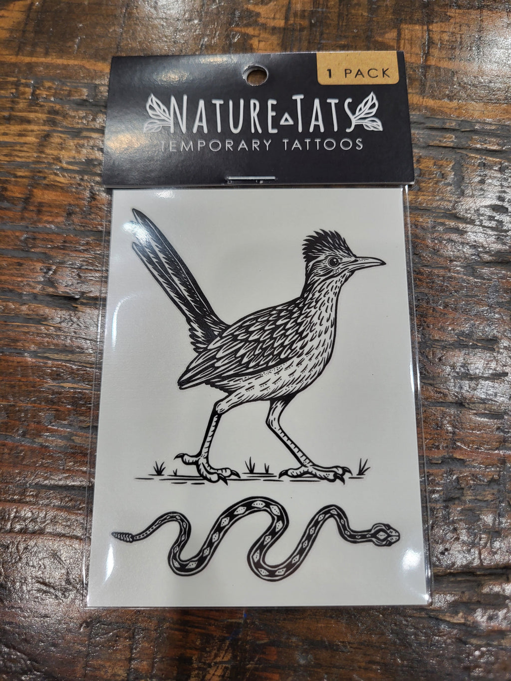 Road runner temporary tattoo 1-pack with bird and snake illustration on front