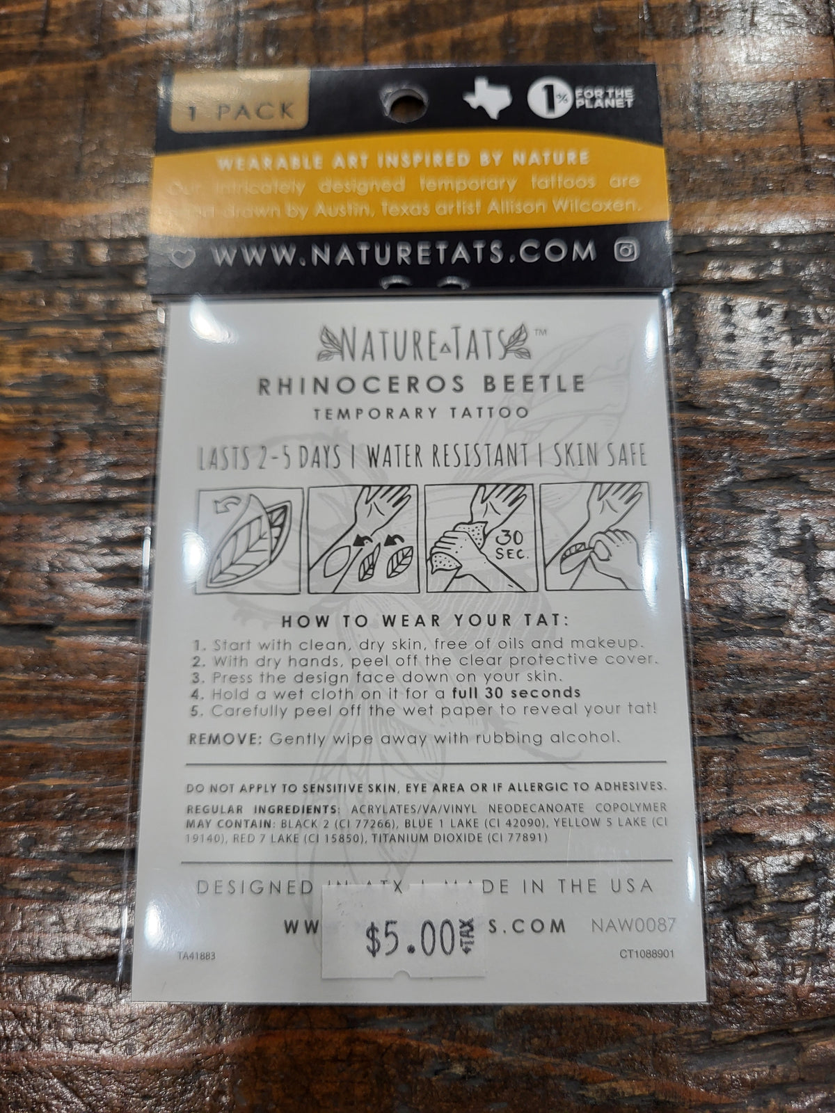 Rhinoceros beetle temporary tattoo pack back with wear instructions and care notes