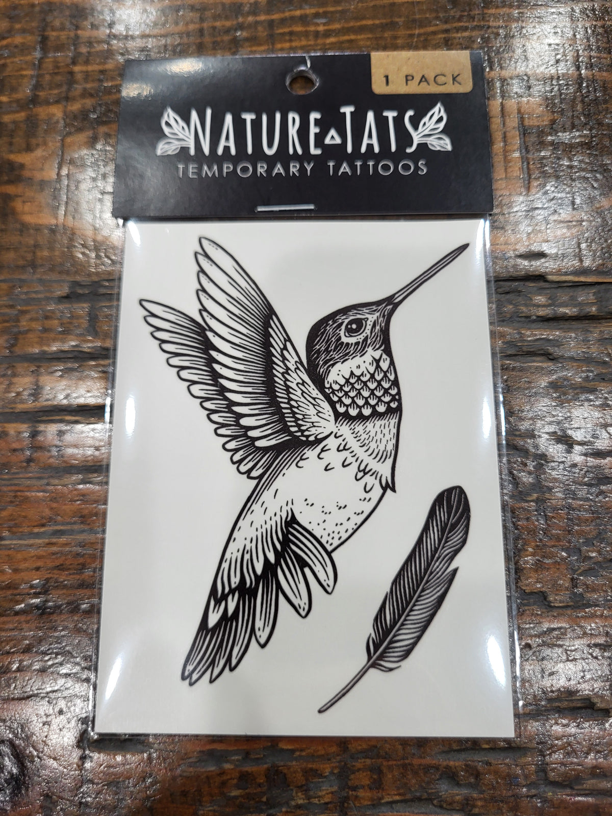Temporary tattoo pack with black hummingbird and feather designs, 1 pack.