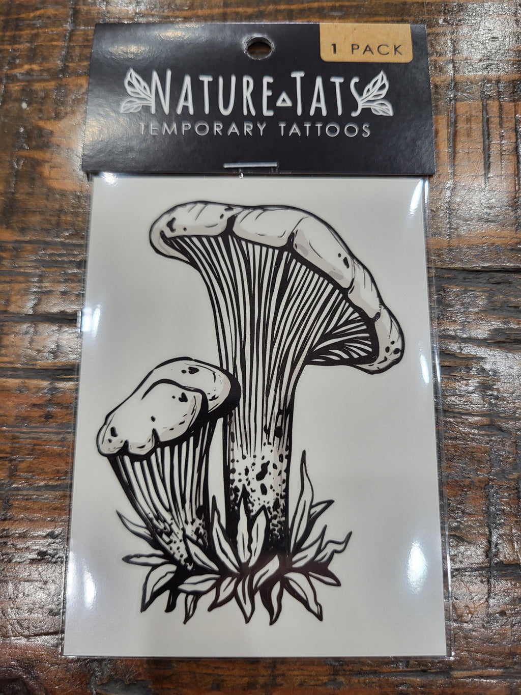 Chanterelle mushroom temporary tattoo pack, shows black and white mushroom design