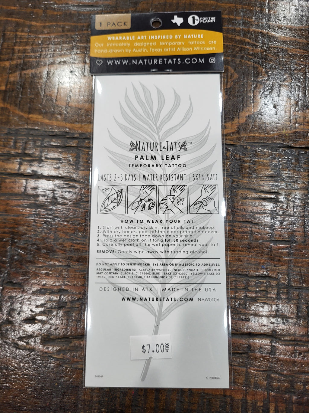 Palm leaf temporary tattoo pack back with wear and care instructions