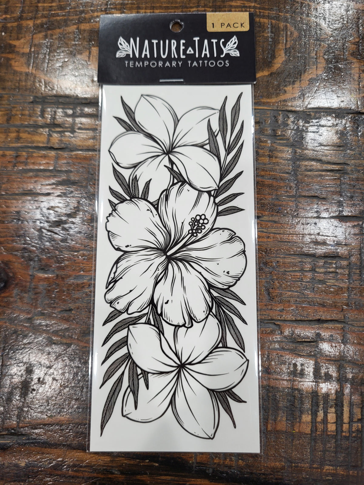 NatureTats tropical floral temporary tattoo sheet with black ink flower and leaf art