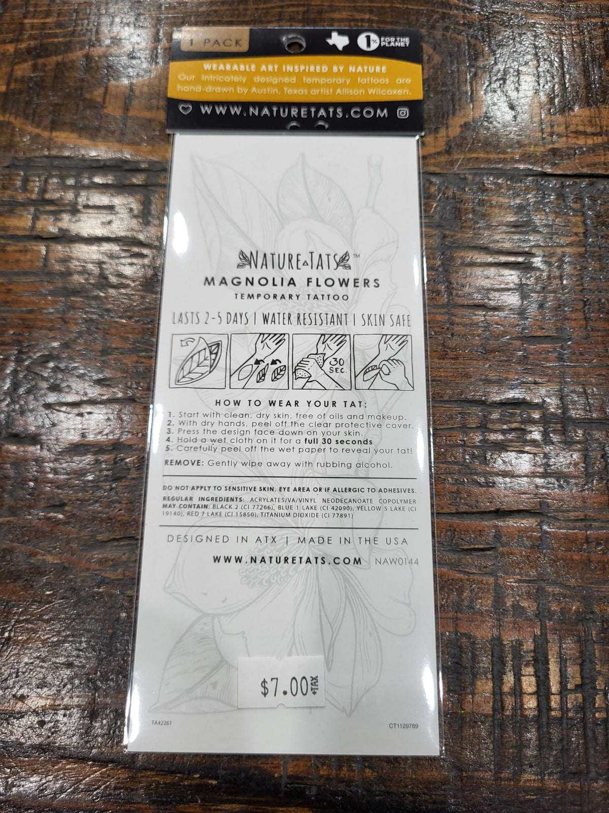 Magnolia flower temporary tattoo pack back with care instructions and floral outline art