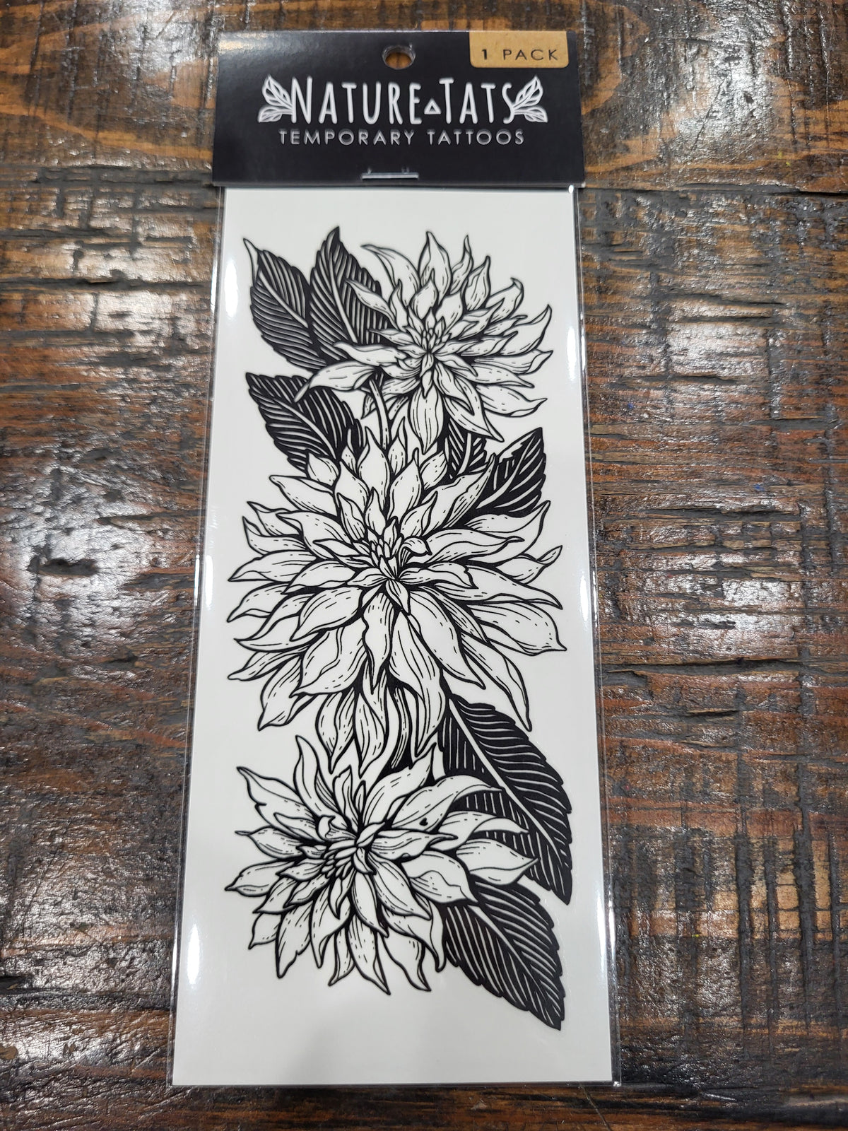 Dahlia flower temporary tattoo sheet with black floral and leaf design, 1 pack