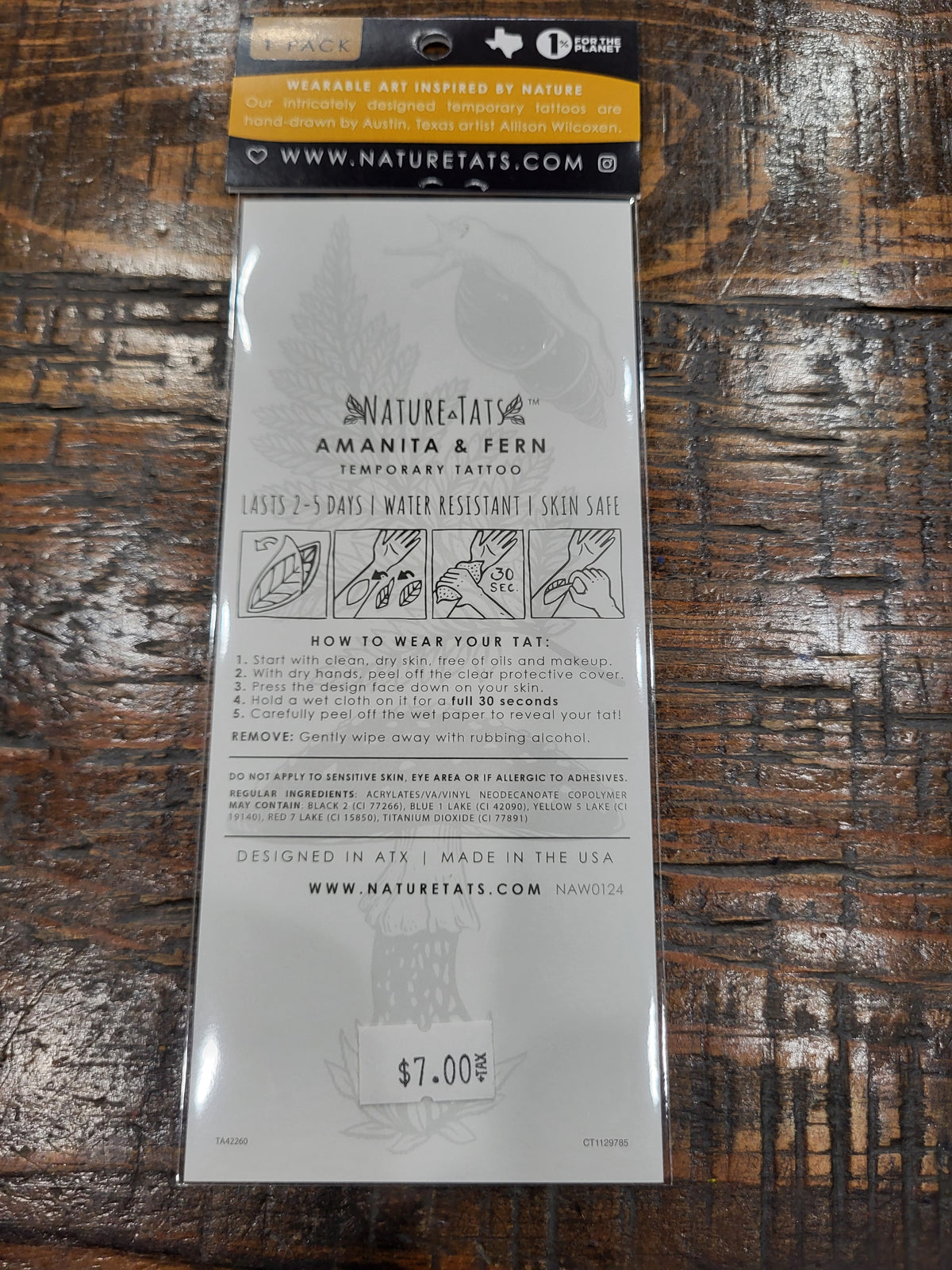 Temporary tattoo back label with care instructions and product information.