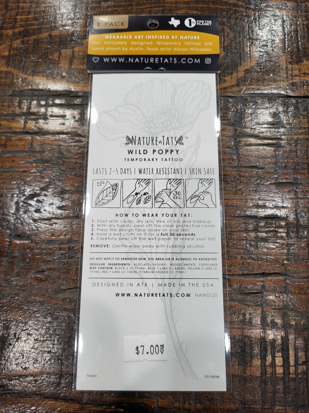 Wild poppy temporary tattoo package back with instructions and line-art flower