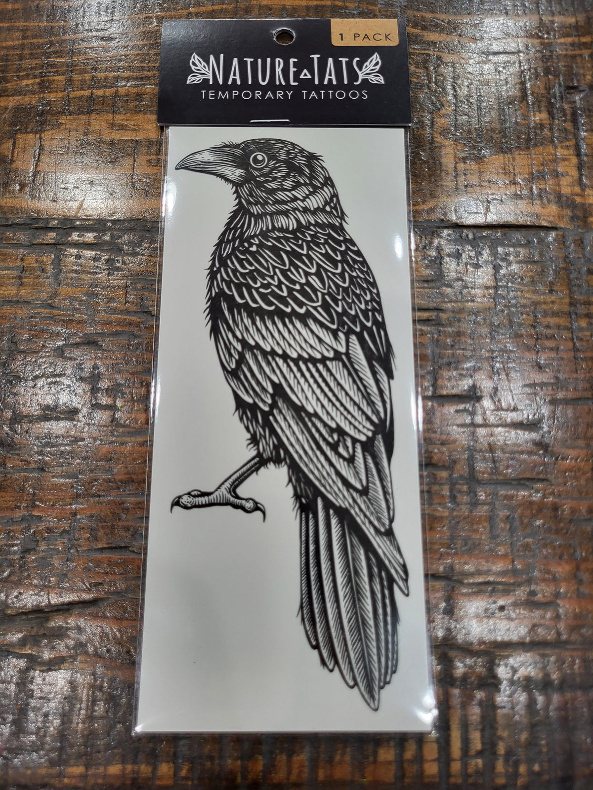NatureTats Raven temporary tattoo pack, black raven bird design on card