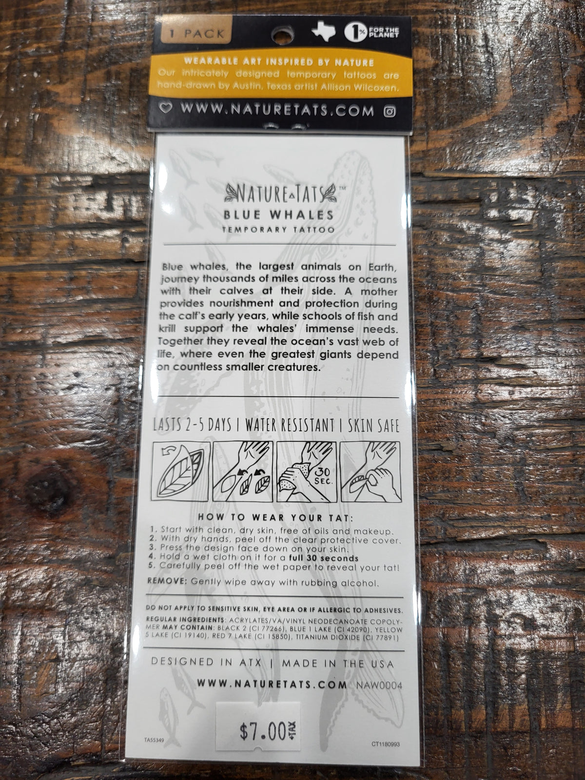 Blue whale temporary tattoo pack back with care instructions icons and product details