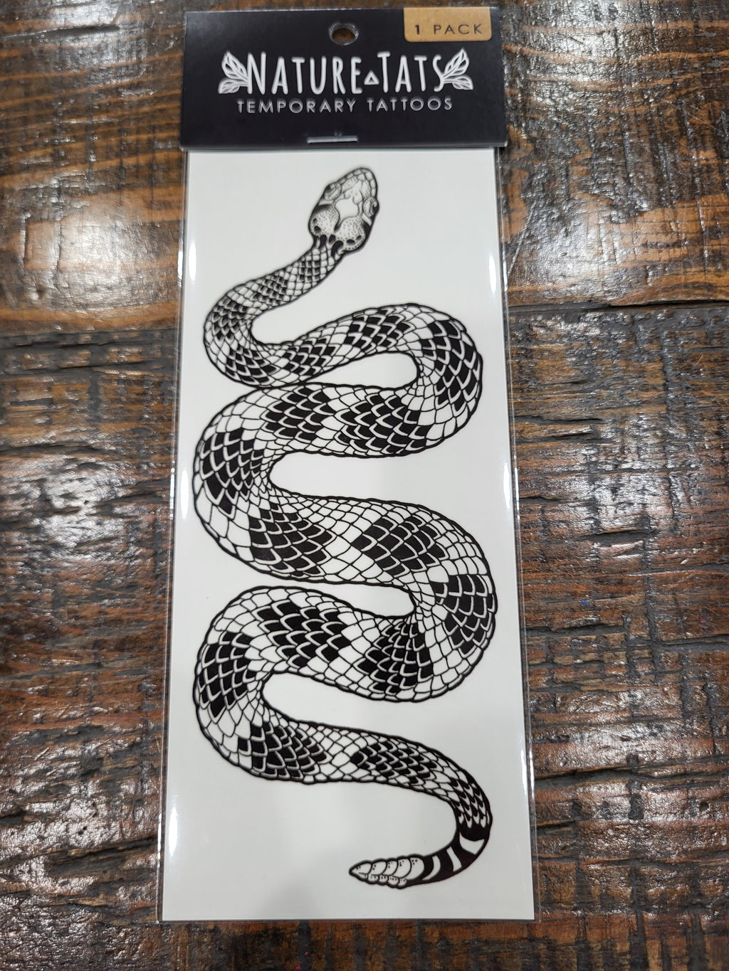 Temporary tattoo sheet package with black-and-white rattlesnake artwork