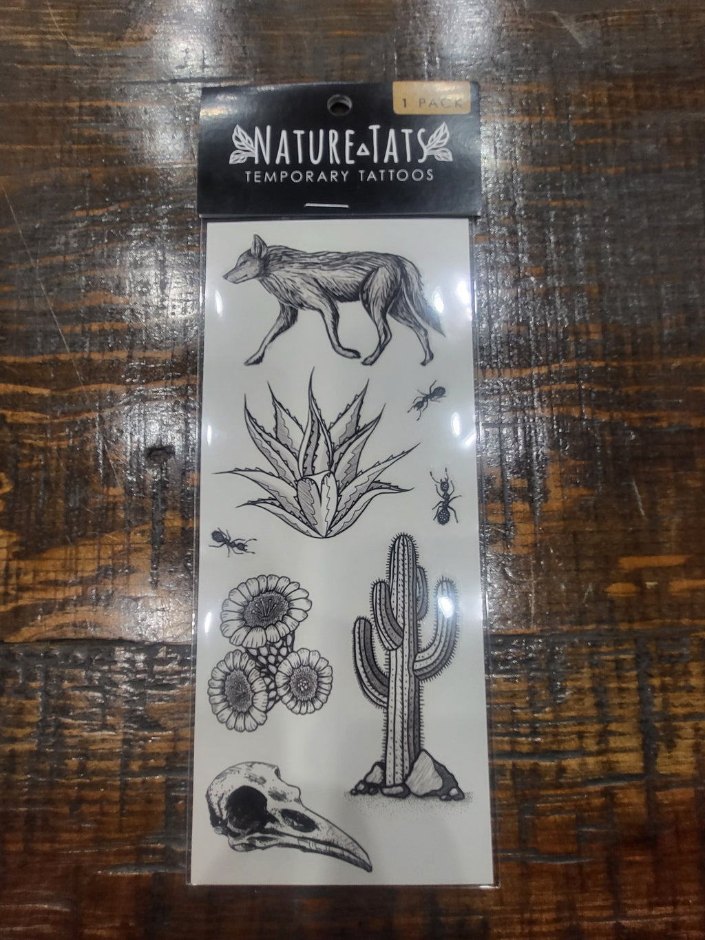 Temporary tattoo sheet package with desert wild animal, cactus, flower, and insect illustrations