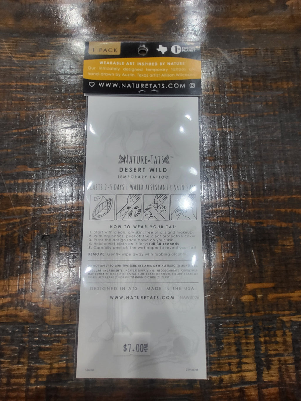 Temporary tattoo sheet back with application steps, details, and safety information