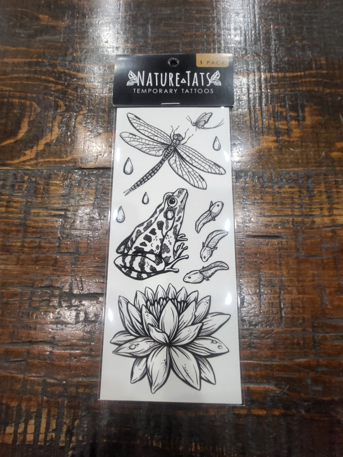NatureTats temporary tattoo sheet with dragonfly, fish and flower line drawings