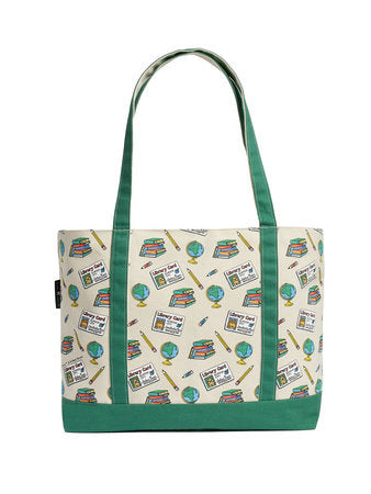 Large tote bag with green handles, green trim, and books-and-cards pattern