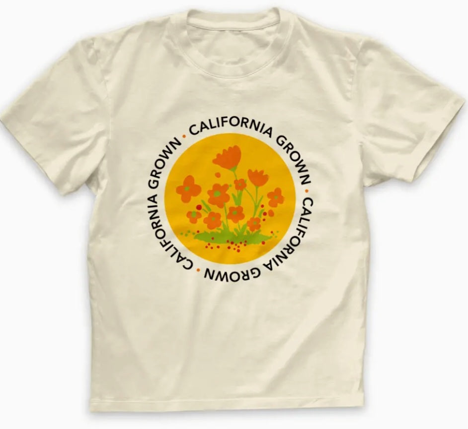 Toddler ivory t-shirt with circular California Grown flower graphic on front
