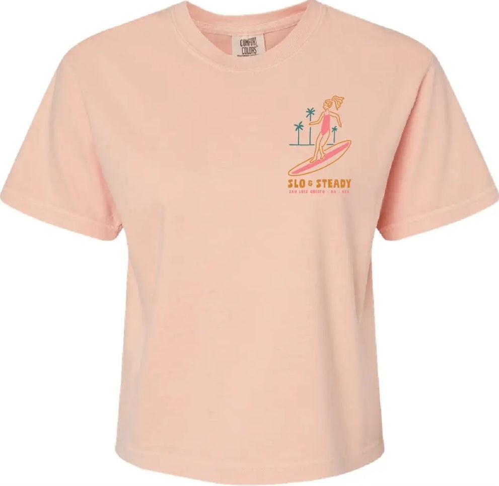 Peach crewneck T-shirt with small front surfer graphic