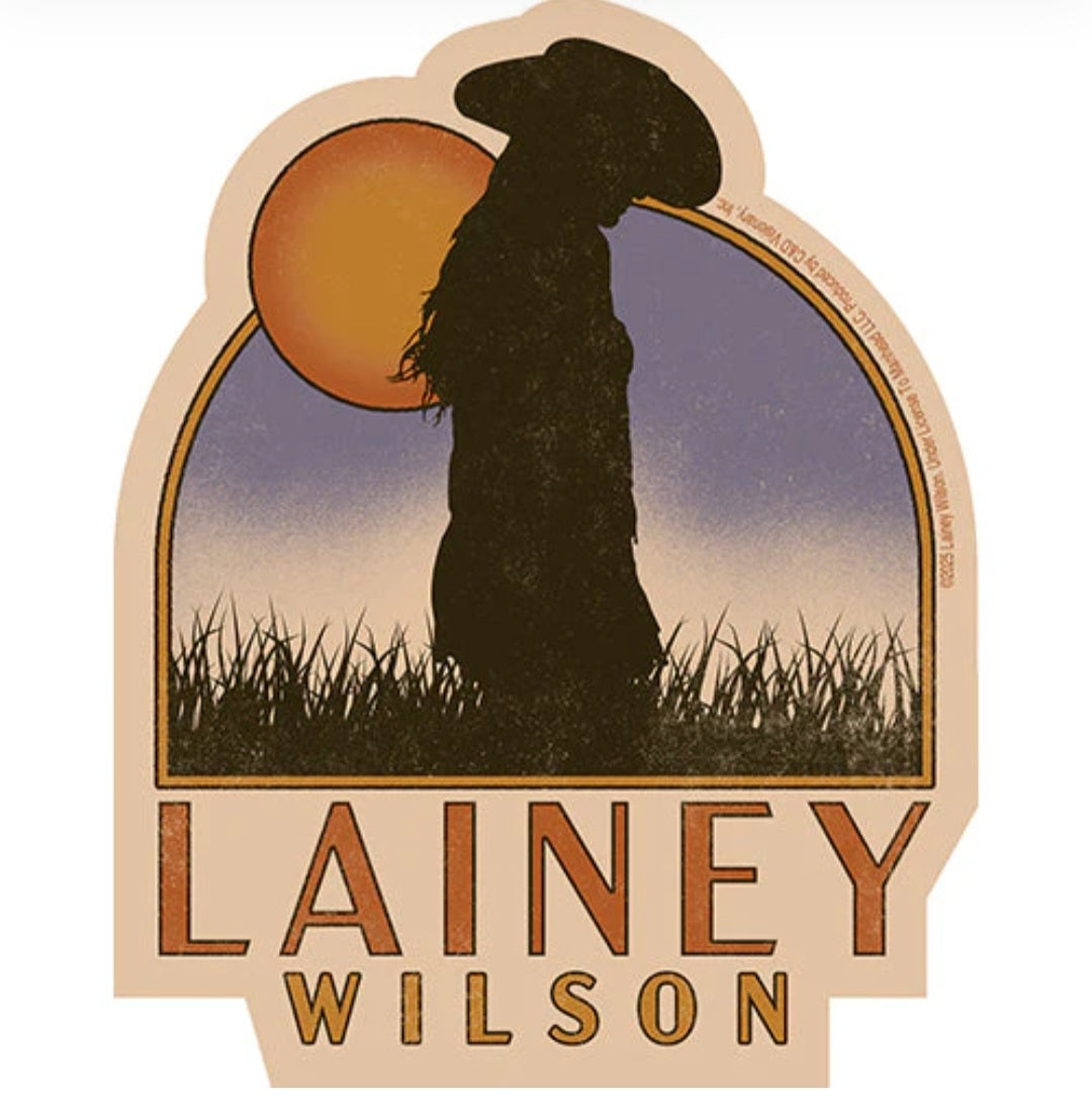 Lainey Wilson band sticker with cowboy silhouette, sunset scene, and LAINEY WILSON text