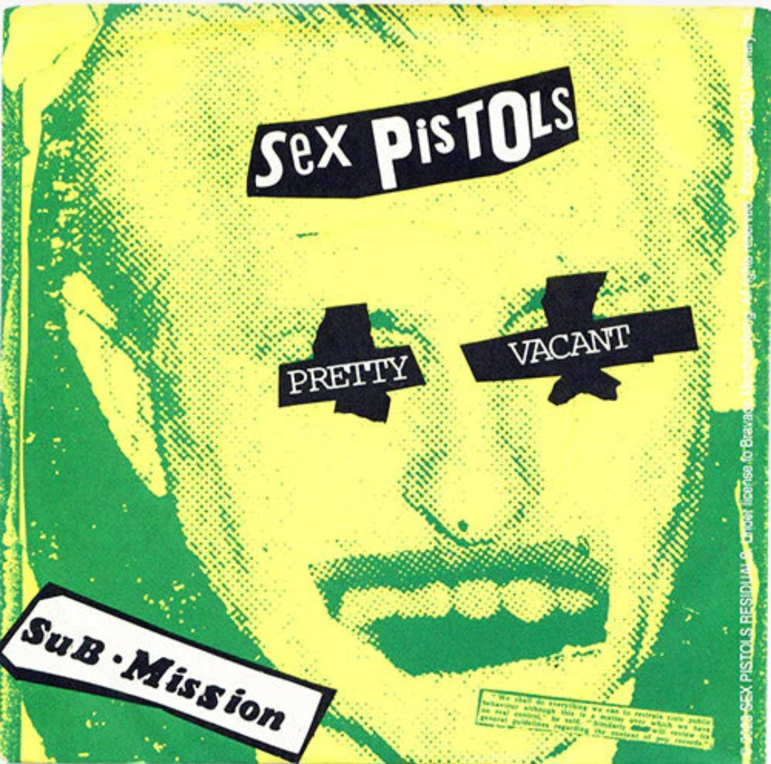 Punk band sticker with bold “Sex Pistols” text and “Pretty”, “Vacant”, “Sub·Mission” labels