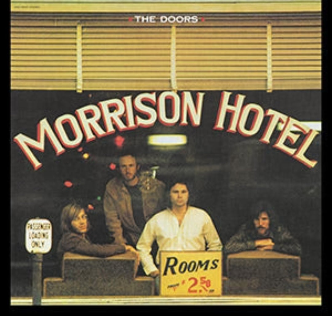 Band sticker with group photo and 'Morrison Hotel' title text in red and white