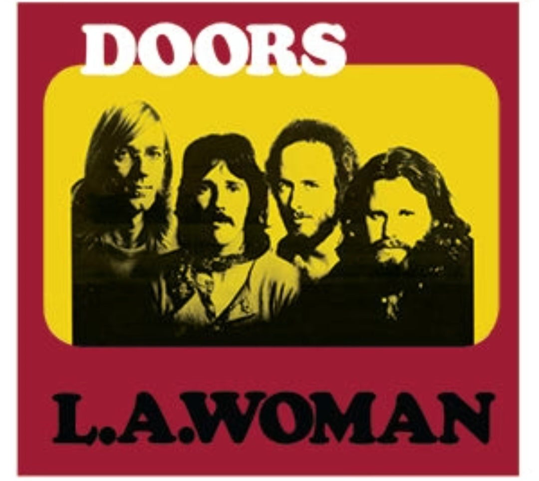 Band sticker with DOORS logo, L.A.WOMAN text, and yellow portrait silhouettes