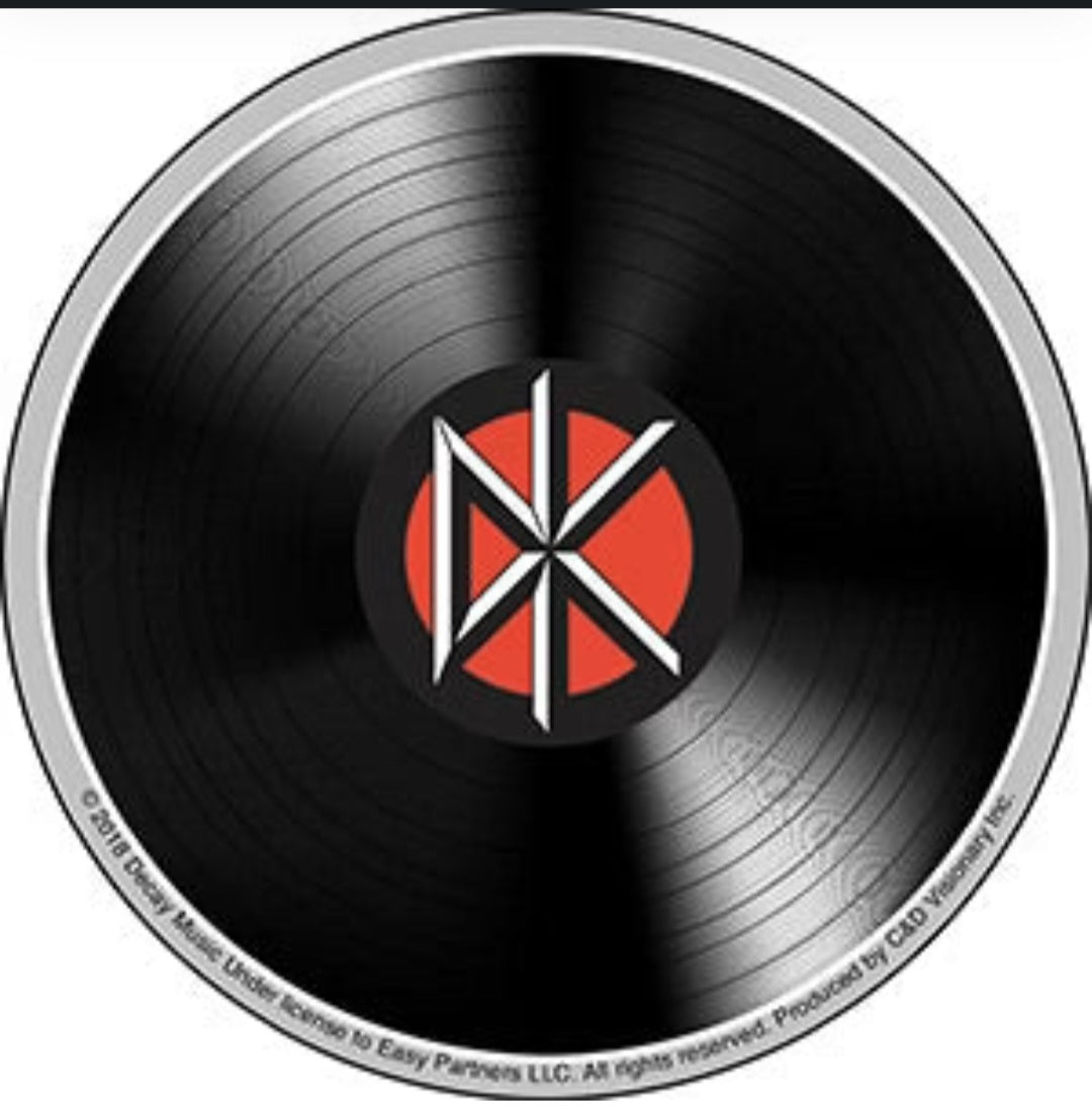 Vinyl record with black grooves and red, white, black center emblem