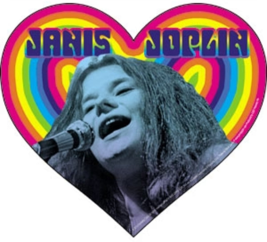 Heart-shaped sticker with singer portrait, rainbow background, and multicolor band lettering