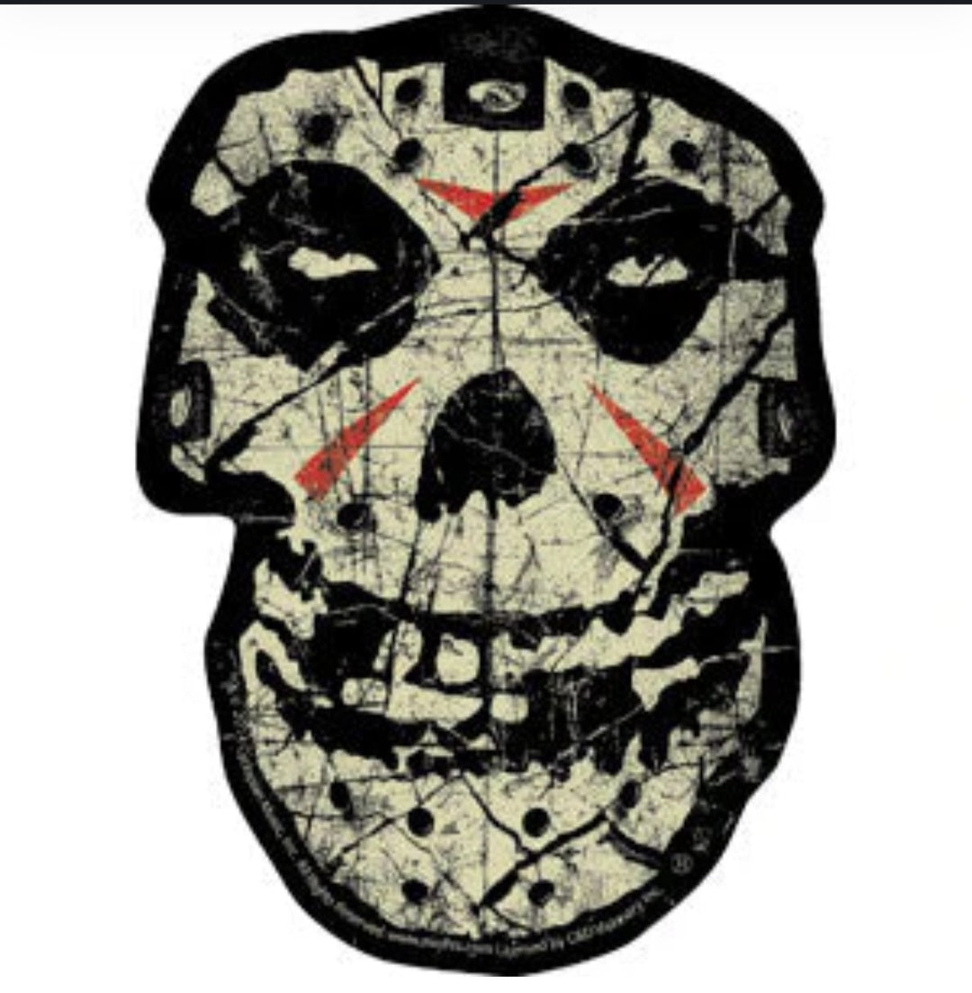 Misfits band sticker: grungy skull with black, off-white and red accents