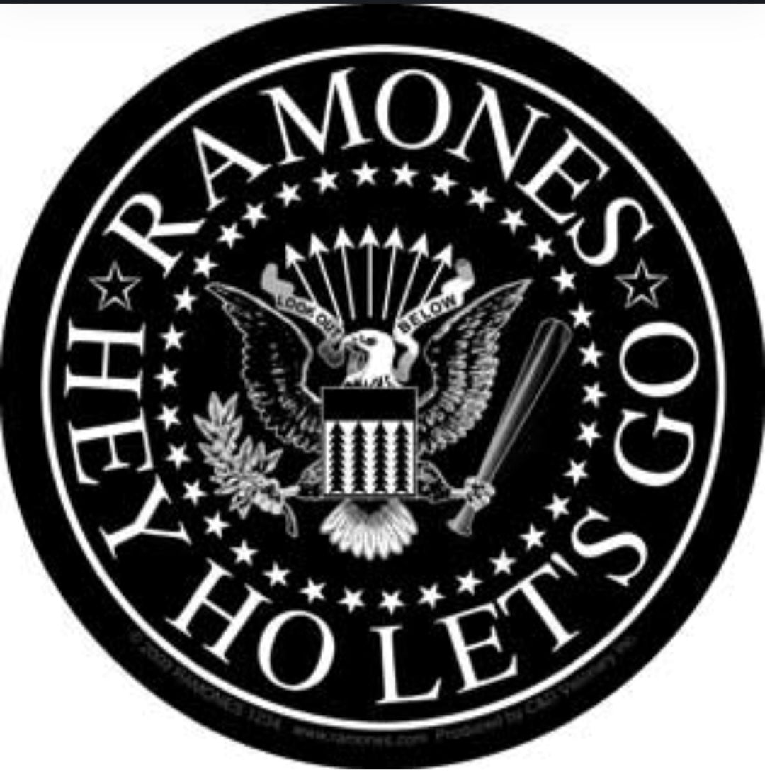 Round black Ramones sticker with eagle, stars, and bold white band text