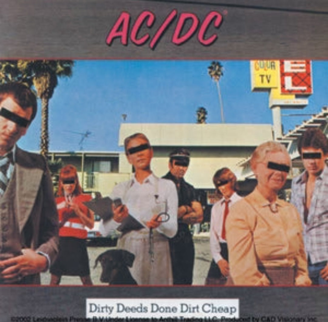 Rectangular AC/DC band sticker with pink AC/DC lettering over a band-photo scene