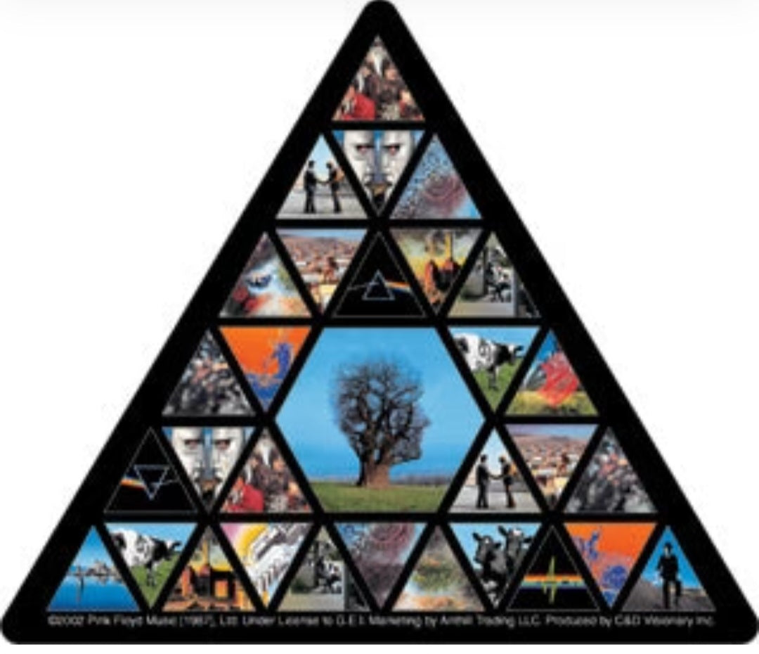 Black triangular band sticker with geometric panels, faces, and a tree illustration