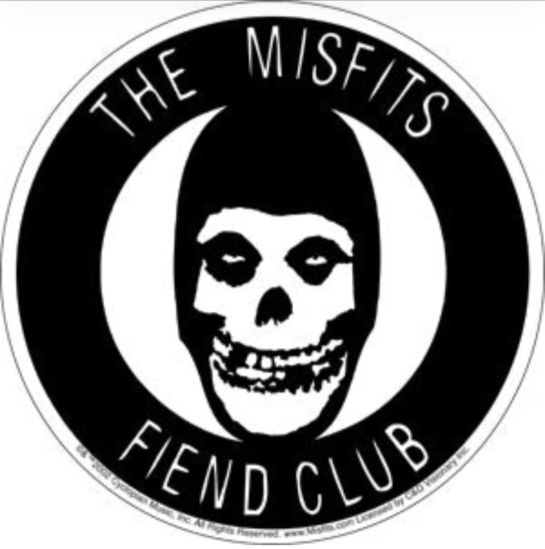 Round Misfits band sticker with black skull face and circular 'THE MISFITS' text