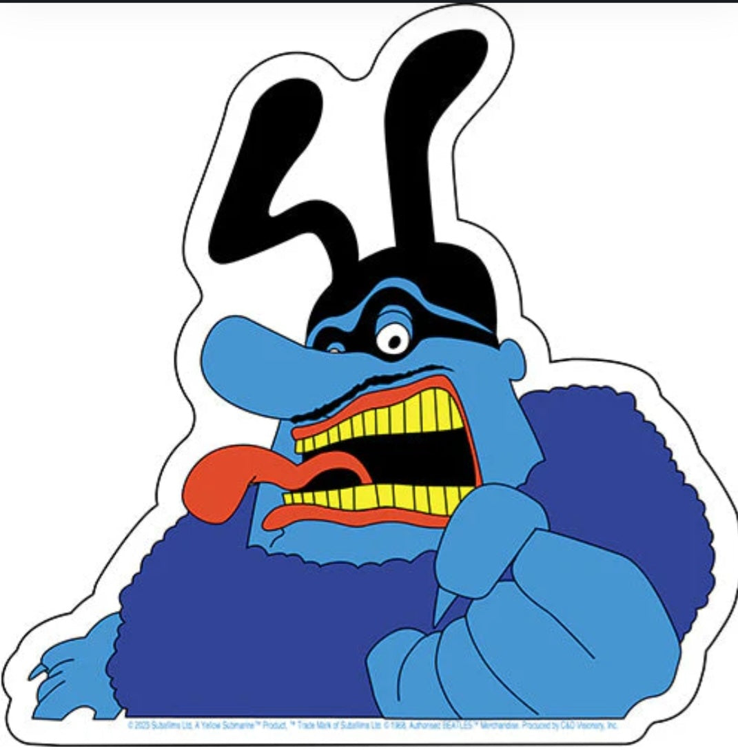 The Beatles band sticker with a blue cartoon character holding a mic