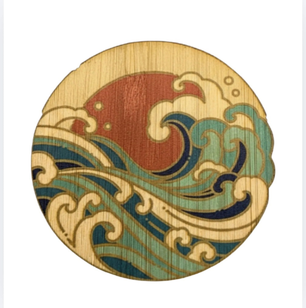 Round bamboo sticker with colorful stylized ocean waves and swirling foam design