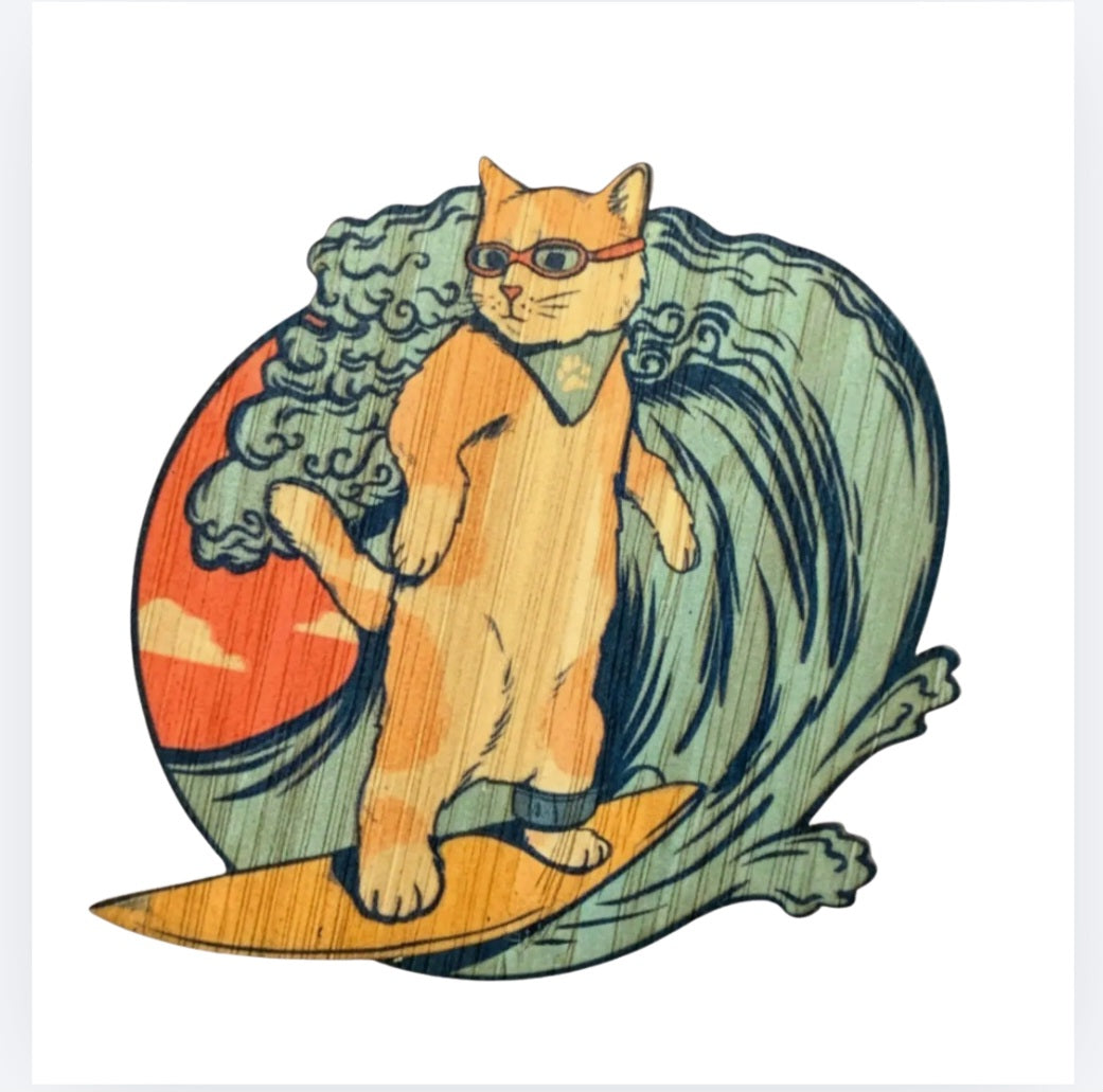 Bamboo sticker of a surfer cat on a wave with orange board and blue water