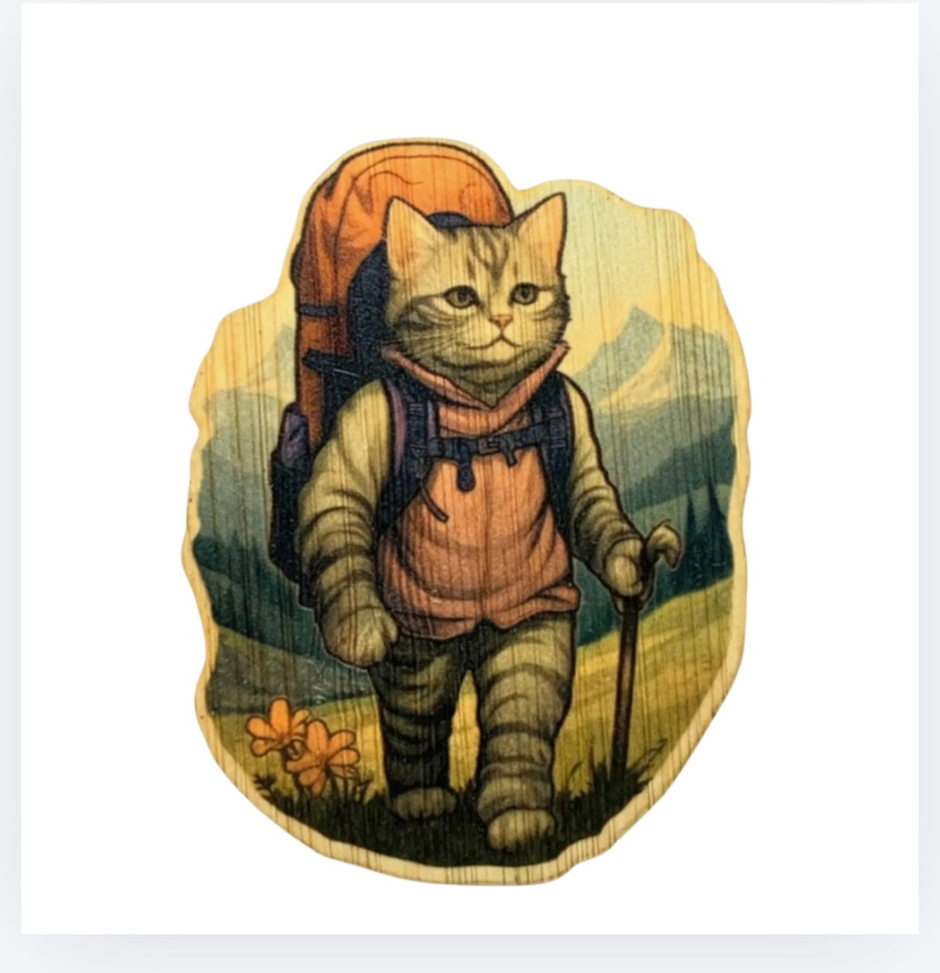 Bamboo hiking cat sticker, cartoon tabby cat in backpack and coat holding a cane