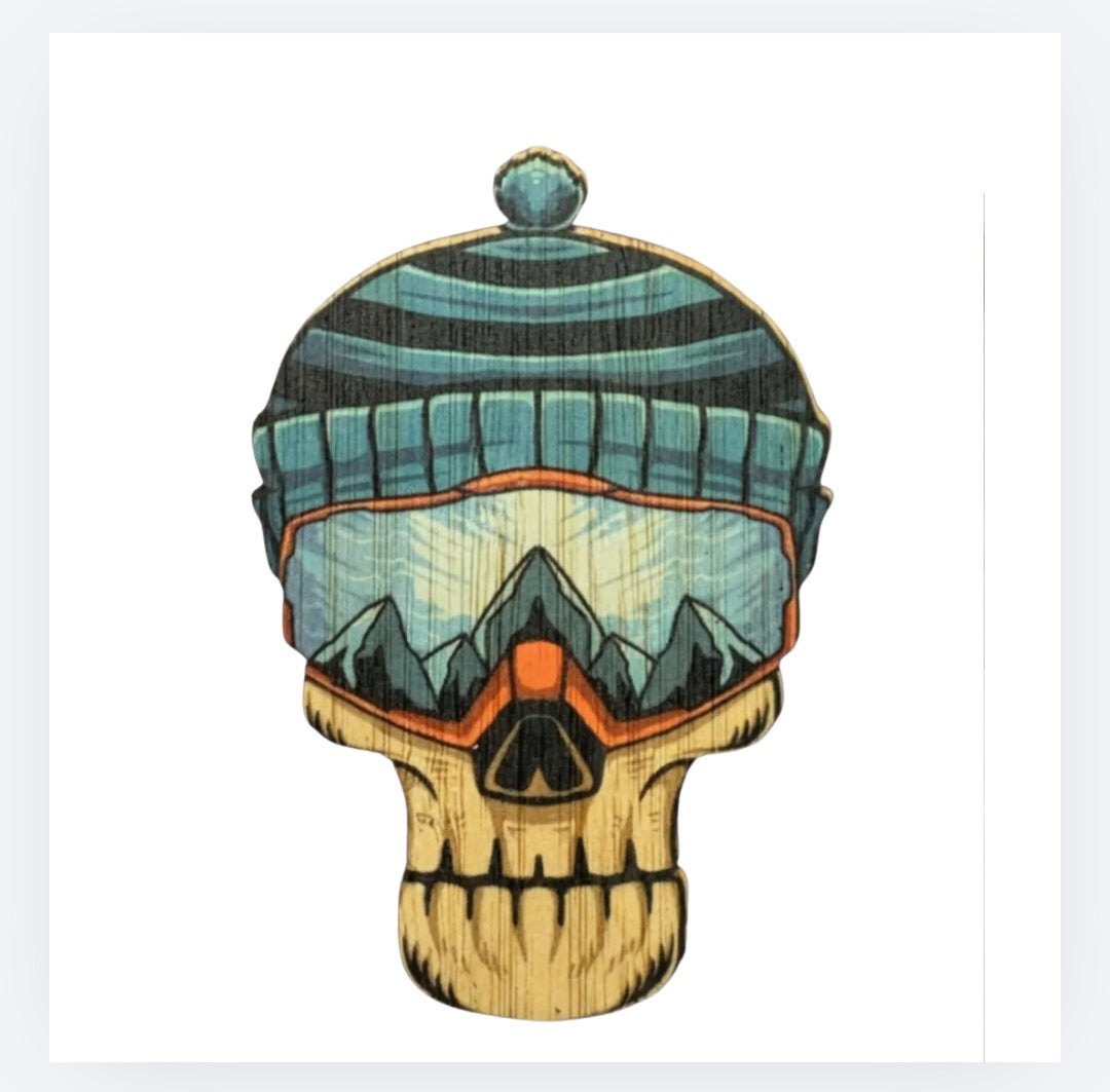 Winter skull bamboo sticker with teal knit hat and mountains illustration