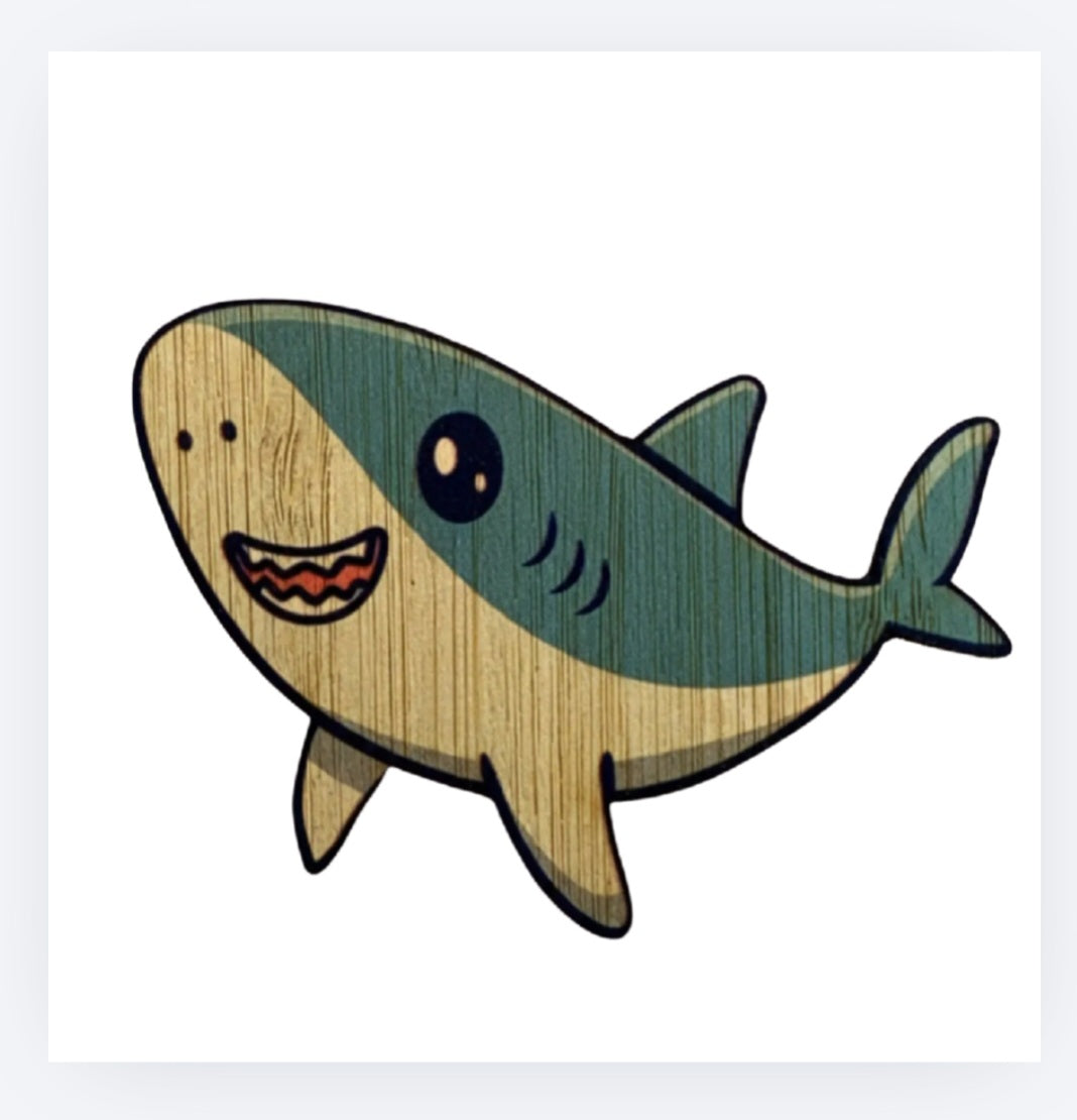Cartoon bamboo shark sticker with teal back and tan belly, smiling face.