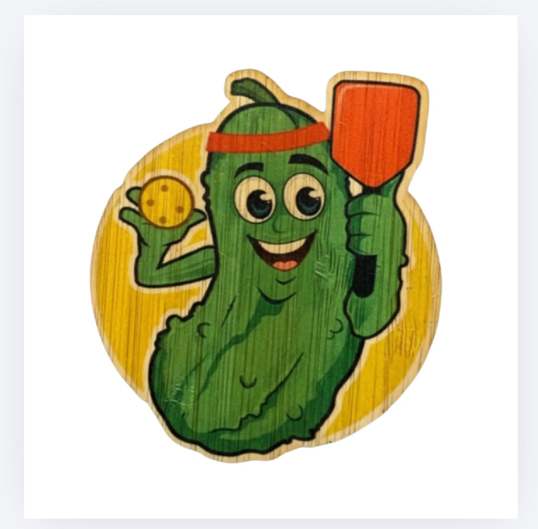 Pickleball bamboo sticker of a smiling green pickle holding a wooden paddle