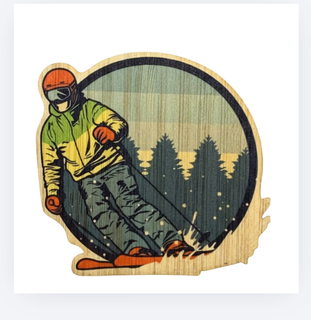 Mountain skier graphic bamboo sticker with circular wood-style border and snowy mountain scene
