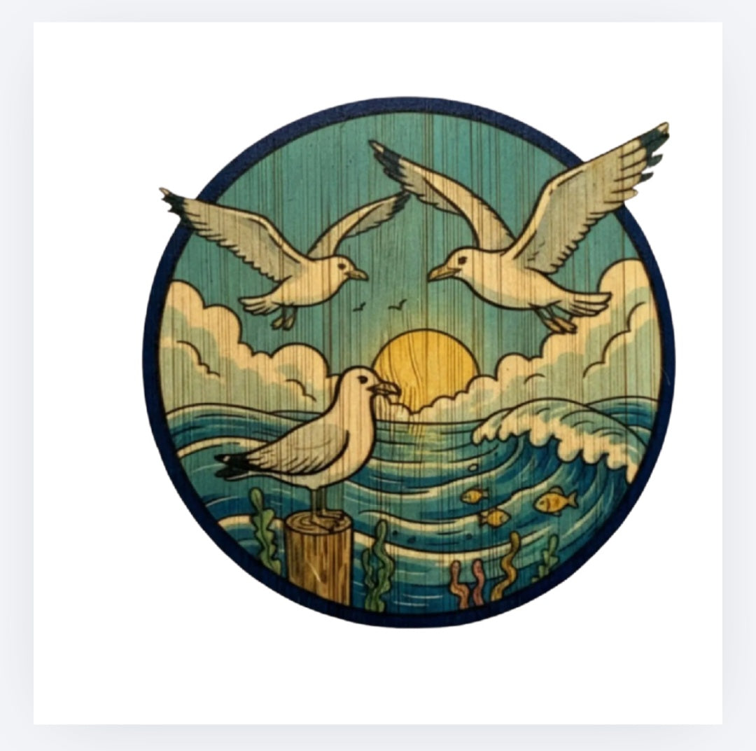 Circular bamboo sticker with seagulls flying over ocean and clouds