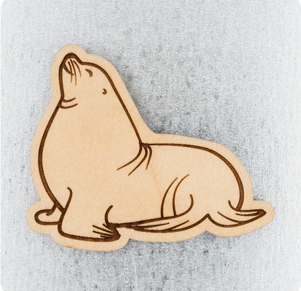 Sea lion wooden magnet with outlined cutout design